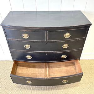 An Ebonized Antique English Chest of Drawers/Dresser