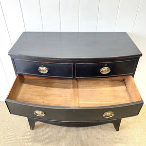 An Ebonized Antique English Chest of Drawers/Dresser