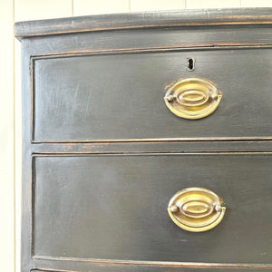 An Ebonized Antique English Chest of Drawers/Dresser