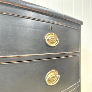 An Ebonized Antique English Chest of Drawers/Dresser