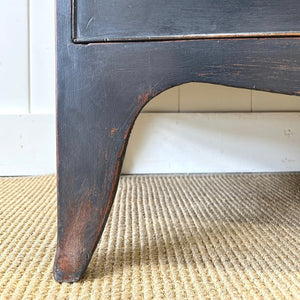 An Ebonized Antique English Chest of Drawers/Dresser