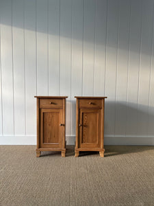 A Charming Pair of English Pine Nightstands