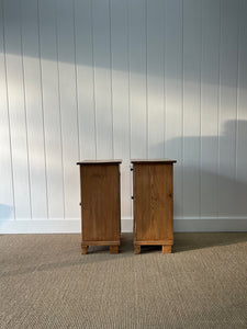 A Charming Pair of English Pine Nightstands