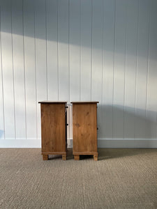 A Charming Pair of English Pine Nightstands