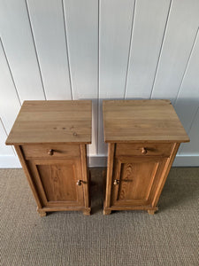 A Charming Pair of English Pine Nightstands