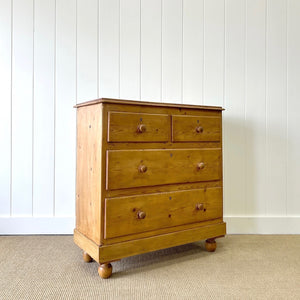 An Antique English Pine Chest of Drawers Dresser with Tulip Feet c1890