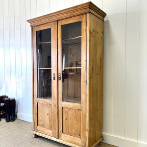 A 19th Century Pine Bookcase with Glazed Doors