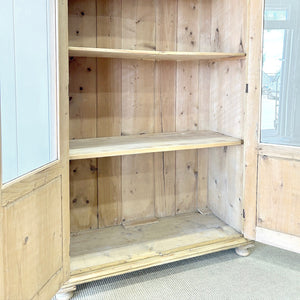 A 19th Century Pine Bookcase with Glazed Doors