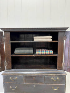 A Large 18th Century Scottish Ebonized Linen Press Cupboard