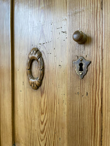 A Charming Pair of English Pine Nightstands