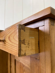 A Charming Pair of English Pine Nightstands