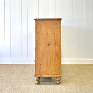 A 19th Century English Chest of Drawers/Dresser with Tulip Feet