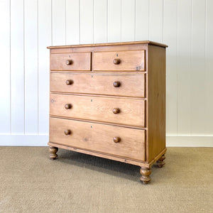 A 19th Century English Chest of Drawers/Dresser with Tulip Feet