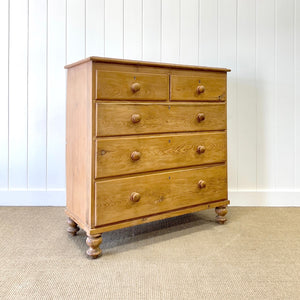 A 19th Century English Chest of Drawers/Dresser with Tulip Feet