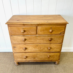 A 19th Century English Chest of Drawers/Dresser with Tulip Feet