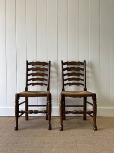 A Vintage Set of 8 English Oak Ladder Back Chairs