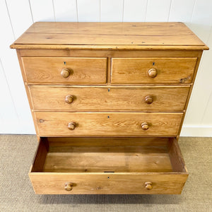 A 19th Century English Chest of Drawers/Dresser with Tulip Feet