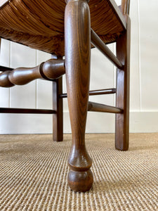 A Vintage Set of 8 English Oak Ladder Back Chairs