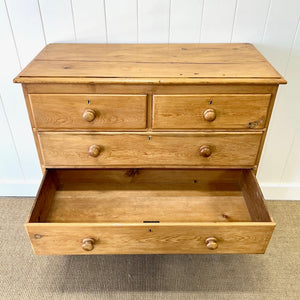 A 19th Century English Chest of Drawers/Dresser with Tulip Feet