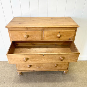 A 19th Century English Chest of Drawers/Dresser with Tulip Feet