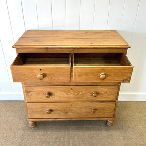 A 19th Century English Chest of Drawers/Dresser with Tulip Feet