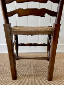 A Vintage Set of 8 English Oak Ladder Back Chairs