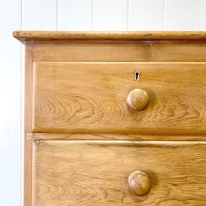 A 19th Century English Chest of Drawers/Dresser with Tulip Feet