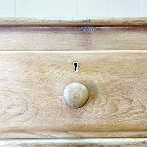 A 19th Century English Chest of Drawers/Dresser with Tulip Feet