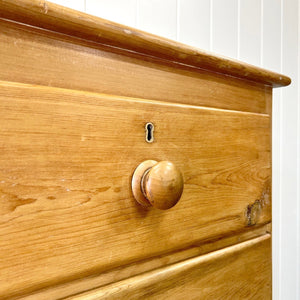 A 19th Century English Chest of Drawers/Dresser with Tulip Feet