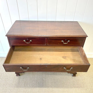 A English Georgian Mahogany Chest of Drawers with Swan Neck Hardware