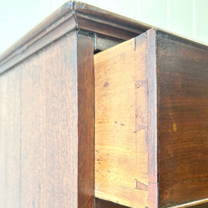 A English Georgian Mahogany Chest of Drawers with Swan Neck Hardware