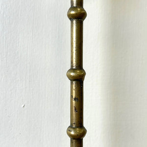 An Antique Victorian Brass Door Stop