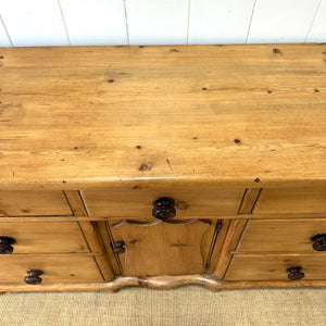 An English Country 7 Drawer Pine Buffet or Sideboard