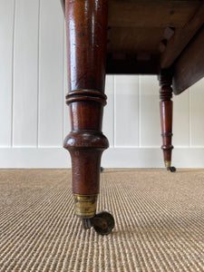 English Mahogany Drop Leaf Table on Casters c1890