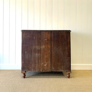 A 19th Century English Chestnut Chest of Drawers/Dresser with Tulip Feet