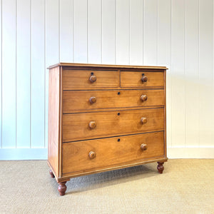 A 19th Century English Chestnut Chest of Drawers/Dresser with Tulip Feet