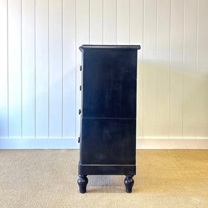 A Tall Ebonized Antique English Chest of Drawers/Dresser