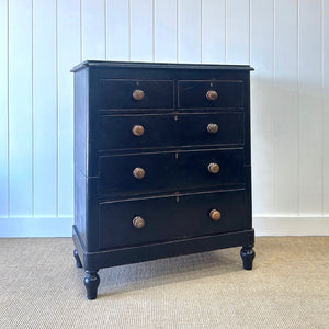 A Tall Ebonized Antique English Chest of Drawers/Dresser