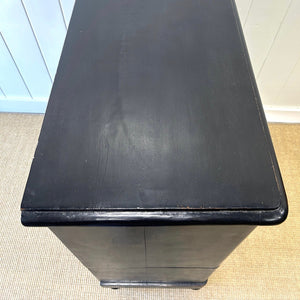 A Tall Ebonized Antique English Chest of Drawers/Dresser