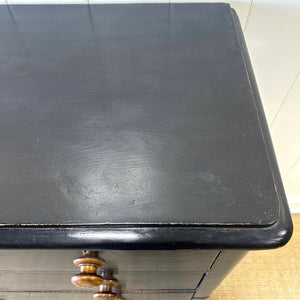 A Tall Ebonized Antique English Chest of Drawers/Dresser