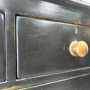 A Tall Ebonized Antique English Chest of Drawers/Dresser