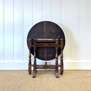 An Antique English Country Oak Folding Occasional Table