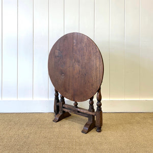 An Antique English Country Oak Folding Occasional Table