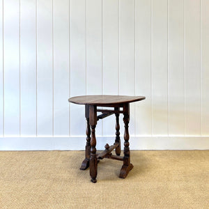 An Antique English Country Oak Folding Occasional Table