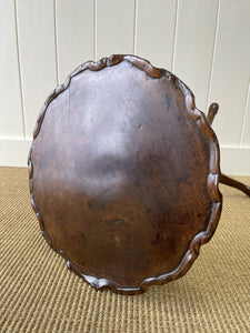 A Delicate English Mahogany Candlestick Table with Pie Crust Top c1790