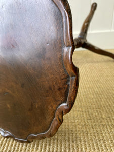 A Delicate English Mahogany Candlestick Table with Pie Crust Top c1790