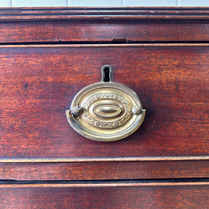 A English Mahogany Chest of Drawers with Oval Brass Hardware