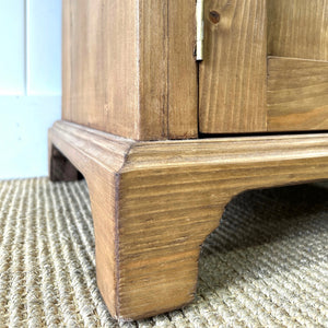 A Charming Pair of English Pine Nightstands with Bracket Feet