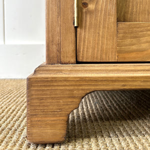 A Charming Pair of English Pine Nightstands with Bracket Feet