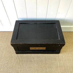 An Ebonized Campaign Sea Chest